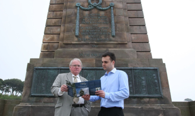 Dr Dan Paton, left and Craig Pearson at the Arbroath War Memorial to launch the Angus Heritage Week commemorations.