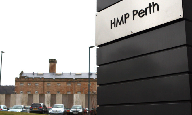 Kris Miller, Courier, 20/02/13. Picture today shows sign for HMP Perth with Perth Prison in background for file.