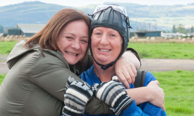 Daredevil Irene Mitchell with Montrose Day Care Centre deputy manager and friend Julie Mackie, who gives her some encouragement before the charity skydive.