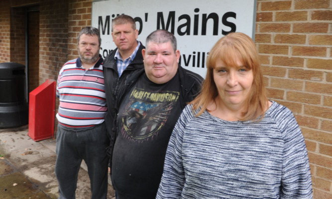 Members of the tenants and residents association who met at Mill o Mains pavilion to discuss the proposed changes to the bus service. From left; Michael Hughes, Jim Malone, Malcolm Spark and Donna Herron.