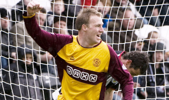 Dundee new boy David Clarkson scores for Motherwell.