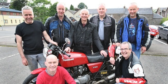 Kris Miller, Courier, 20/06/11. Picture today at Academy Street, Forfar shows the group of 7 friends who are travelling to Greece on £300 motorcycles. Pic shows back L/R, Colin Ritchie, Fred Heenan, Gordon Phillip, Graeme Phillip and Jim Morrison and front Gordon Alexander and Kim Cessford.