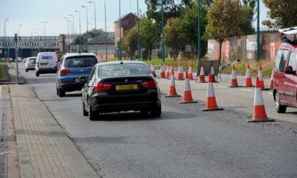 A driver has complained about the uneven new surface on Riverside Drive.