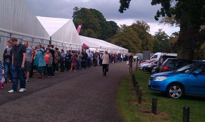 Long queues at the flower and food festival on Saturday.