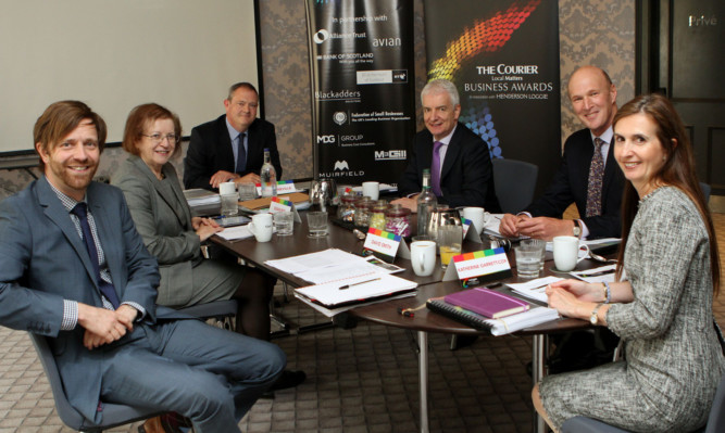 The Courier Business Awards judges meet for the shortlisting session.
From left: David Smith of Henderson Loggie, Lady Susan Rice, Courier
editor Richard Neville, Peter Lederer, Sandy Richardson and panel
chairman Katherine Garrett-Cox.
