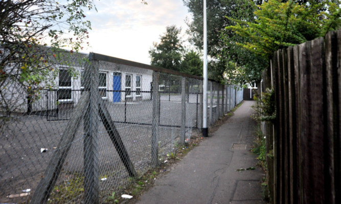 The lane running between North Muirton Primary School and Kerr's home.