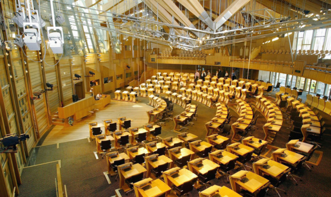 EDINBURGH, SCOTLAND  AUGUST 31: The new debating chamber of the new Scottish Parliament building at Holyrood, Edinburgh. The uniquely designed building welcomes the  first of it's many staff,  August 31, 2000. The project designed by Catalan architect Enric Miralles has run massively over budget and will enter service next week and be opened by the Queen at a formal ceremony in early October.  (Photo by Christopher Furlong/Getty Images)