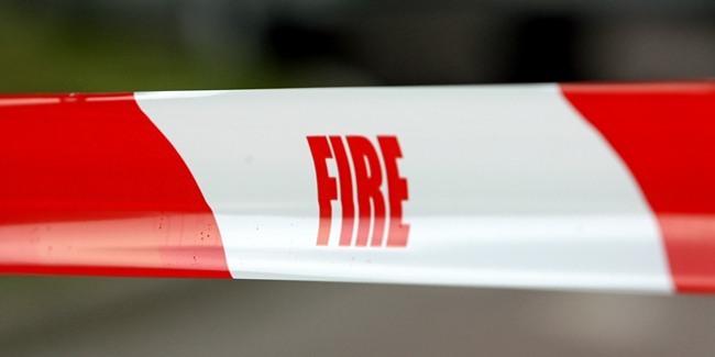 Kim Cessford, Courier 15.06.11 for file - Fire Brigade safety tape to exclude people from an incident area