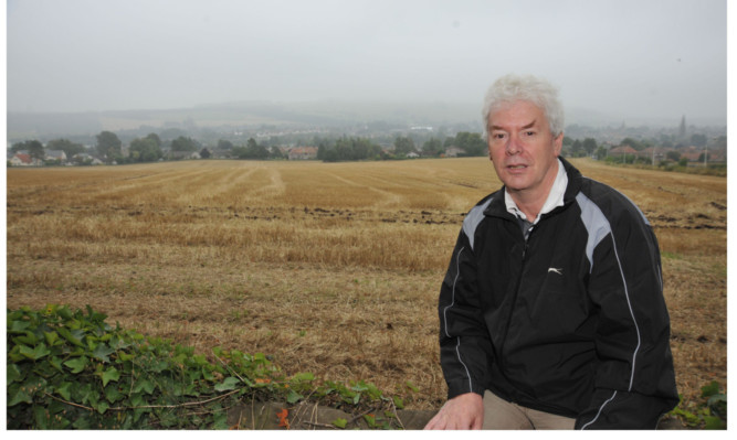 Councillor Bryan Poole at the site of the proposed Cupar North development.