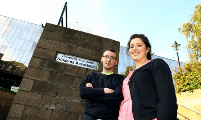 Outside the Dundee University Students Union are Joseph Geoghegan and Julie Allison of the Life Society.