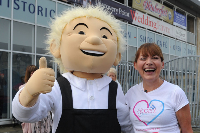 Oor Wullie helped to put Lorraine Kelly through her paces as part of charity challenge at Discovery Quay on Saturday. The TV presenters special Zumba class came at the end of a 24-hour endurance fitness class to help tackle child poverty.