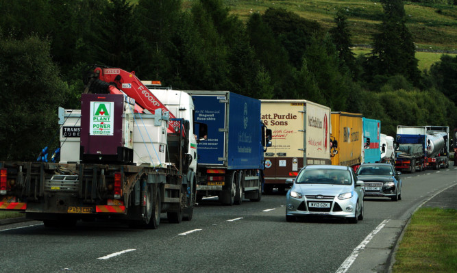 Lorries on a single-carriageway section of the A9.