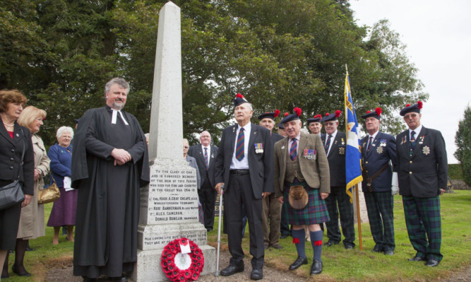 The Rev Brian Ramsay with Bill Herd and Ronnie Proctor and others who attended the service.