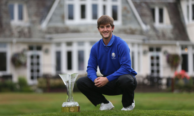 Bradley Neil with the Junior Ryder Cup trophy he will help Europe compete for next week at Blairgowrie.