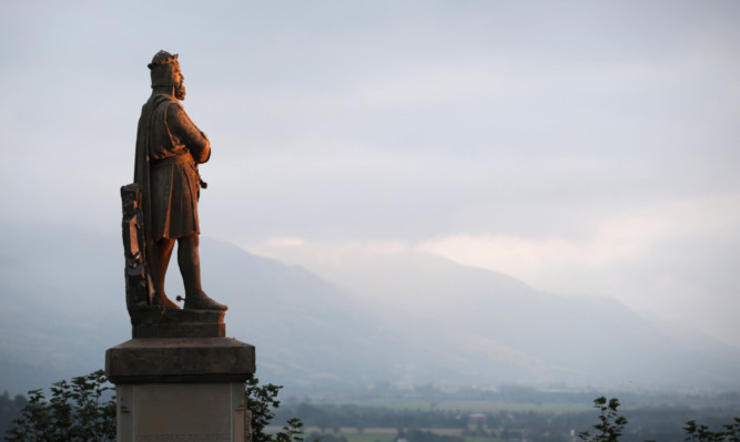 A statue of Scottish King Robert the Bruce looks out over Stirling.