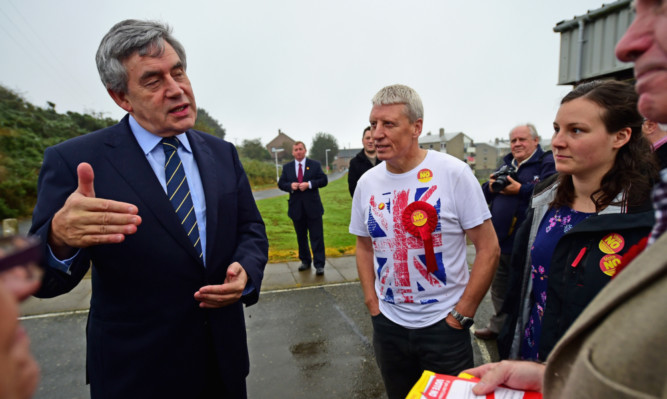 Gordon Brown visits a polling station at North Queensferry Community Centre.