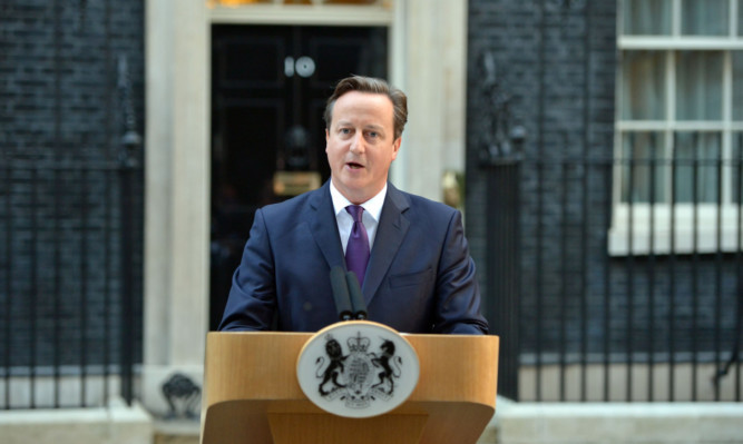 Prime Minister David Cameron makes a statement in Downing Street.
