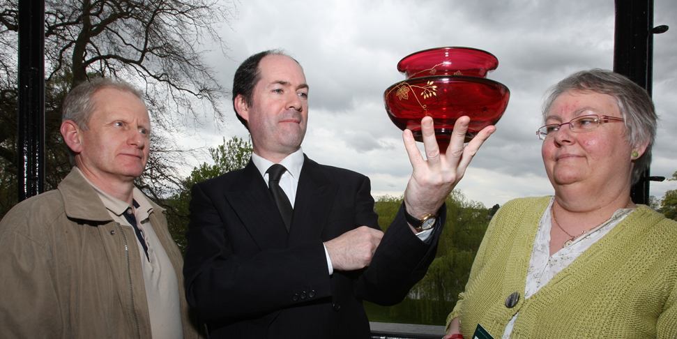 Kris Miller, Courier, 05/05/10, News. Picture today at Bell Ingram, Perth. Bonham's auctioneers had an open valuation day today. Pic shows David Smith (left) and Marjory Smith (right) with Gordon McFarlan (Bonhams, Director UK Board Valuations) with a ruby glass bowl by Bacarrat, French circa 1900 (worth £400-£600).