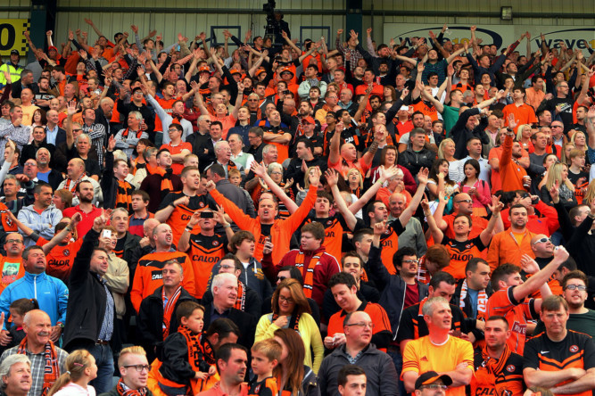 Fans turned out in their thousands as Dundee and Dundee United met in the first derby of the season on Sunday. Paul Hartleys side went into the match unbeaten, but had no answer to a strong United performance, with Jackie McNamaras Tangerines winning 4-1. The sides meet again on Wednesday.