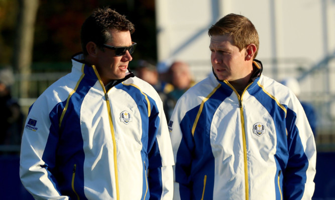 Rookie Stephen Gallacher (right) seeks out  Lee Westwood's counsel during pre-tournament preparations.