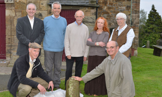 Back row: John Wood, Robert Balfour, Neil Sutherland, Christine Manson and Maureen Brand. Front row: Bruce Manson and Gavin Brown.