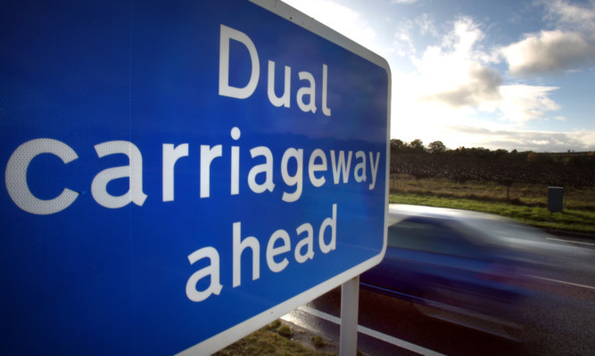 Kris Miller, Courier, 06/11/13. Picture today shows Dual Carriageway ahead sign near Luncarty on the A9 for files.