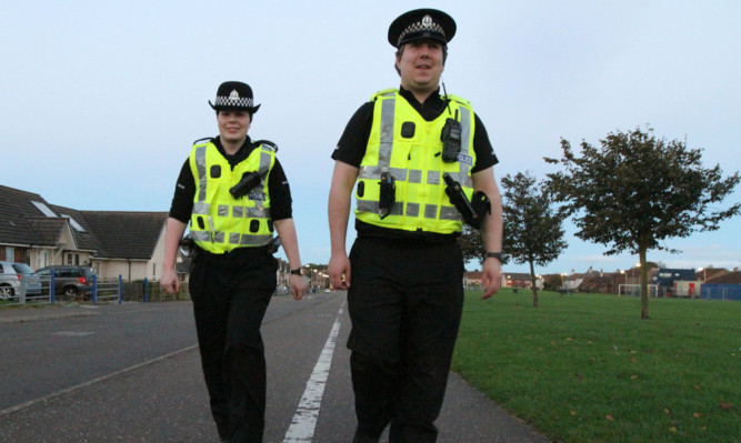 Special Constable Lauren Elliott and PC Bob Young on patrol.