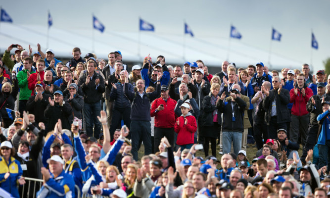 Crowds cheering Europe to victory.