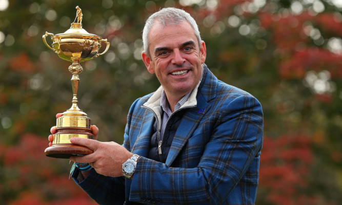 Paul McGinley with the Ryder Cup after a night celebrating at Gleneagles.