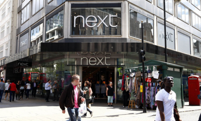Retailer Next may be forced into lowering its profits guidance for this year if the Indian summer continues for the rest of this month.