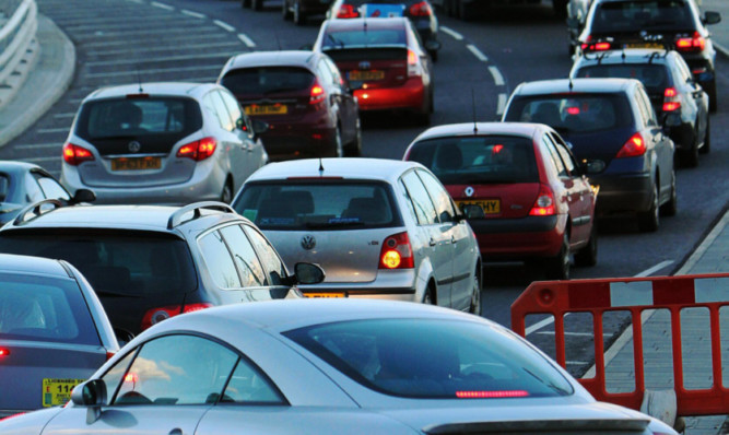 The traffic congestion due to roadworks on the Tay Bridge
