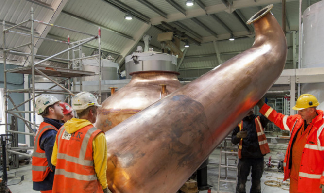 One of the stills being lifted into position.