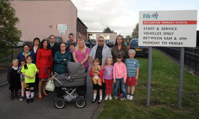 Cara Hilton MSP and Thomas Docherty MP join some of the parents at the Pitcorthie Primary School gates.