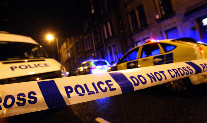 Police at an address in Pitkerro Road, Dundee where a man was injured.