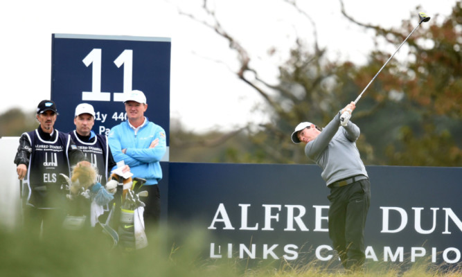 Rory McIlroy battling the conditions at Kingsbarns.