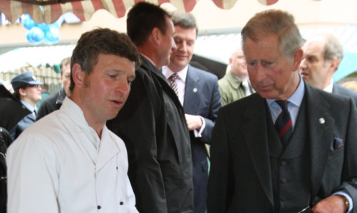 Andrew Johnston presenting his produce to Prince Charles at a farmers' market in Perth.