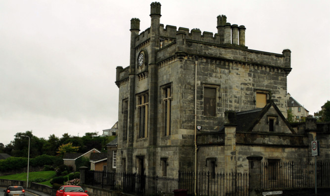 The restored Town Hall sits close to the proposed site for the council flats.