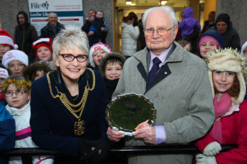 Kay Morrison presenting Campbell Morris with his citizen of the year award.