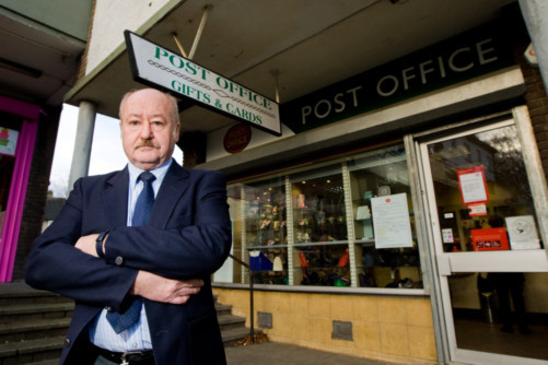 Councillor Ian Sloan outside the post office.