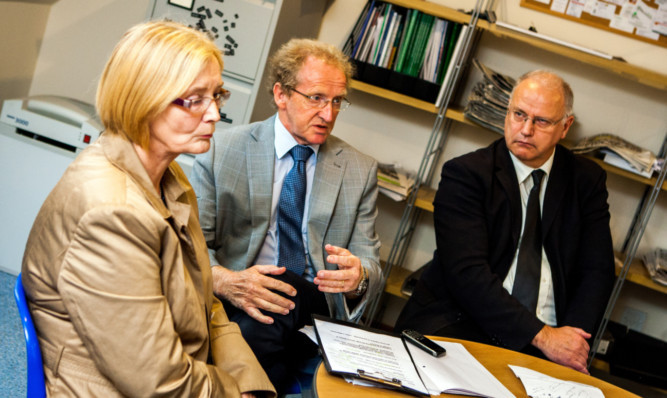 From left; Tricia Marwick MSP, Lindsay Roy MP and Council Leader David Ross discuss job losses at Velux in Glenrothes.