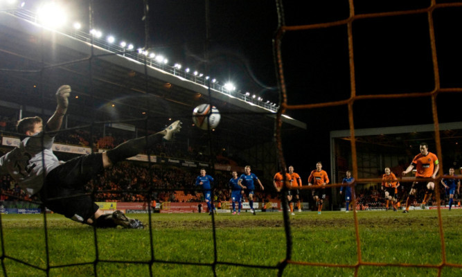 Jon Daly completes the scoring from the penalty spot.