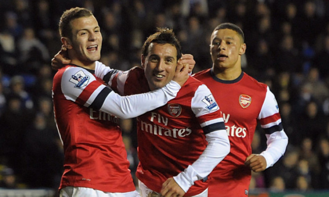 Arsenal's Santi Cazorla celebrates scoring his side's fourth goal.