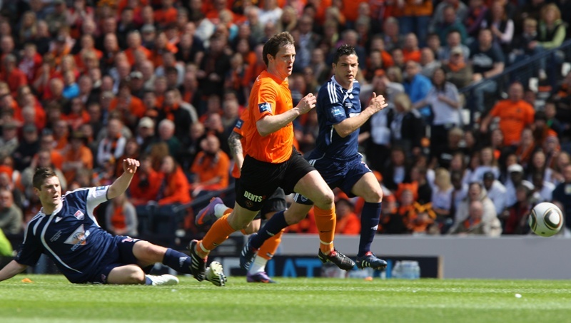 Kris Miller, Courier, 15/05/10, Sport.
Acvtive Nation Scottish Cup Final, Hampden Park. Dundee United V Ross County.

Action from the first half.