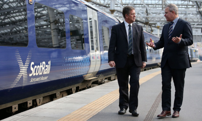 Jeff Hoogesteger (right) CEO of  Dutch rail operator Abellio and Scottish Transport Minister Keith Brown.