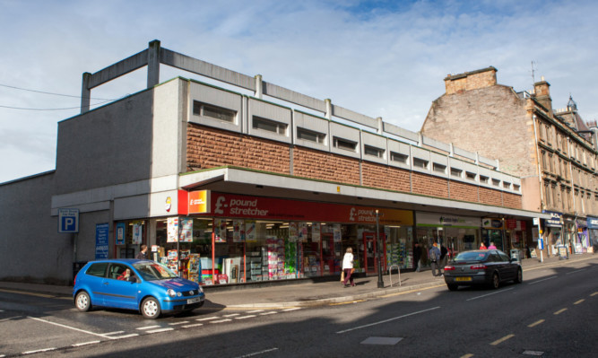 The woman was attacked outside Poundstretcher in Scott Street.