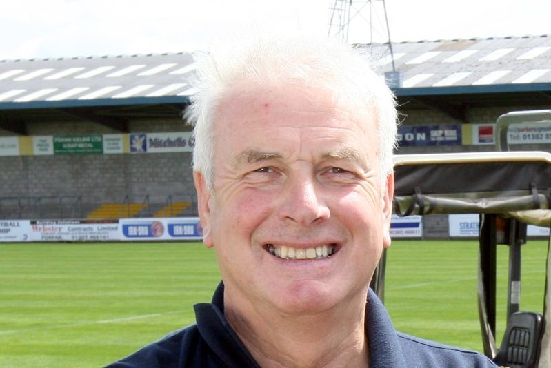 Forfar Athletic Football Club Chairman to be holiday stand-in Groundsman.    Left to right, Forfar Chairman Neil Wilson and Groundsman Dennis Fenton.