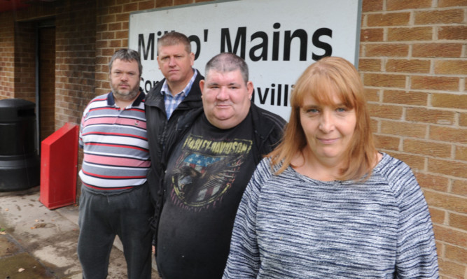 Mill o Mains Tenants and Residents Association members who are worried about their local bus services. From left: Michael Hughes, Jim Malone, Malcolm Spark and Donna Herron.