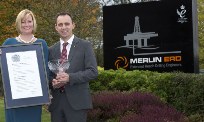 Managing director Iain Hutchison described the accolade as a magnificent honour. Debbie and Iain Hutchison are seen with the coveted award.