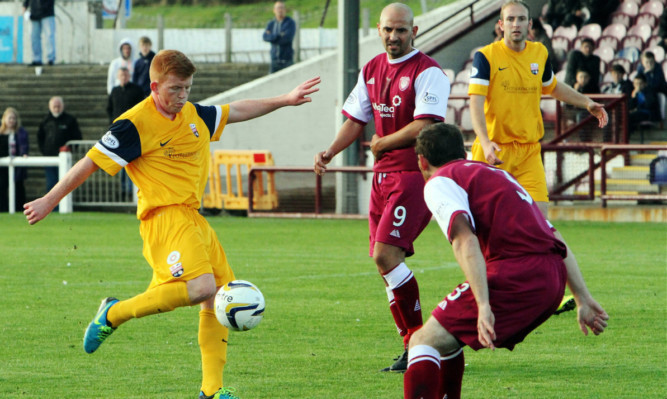 Ross McCord of Montrose tries his luck in the first clash.