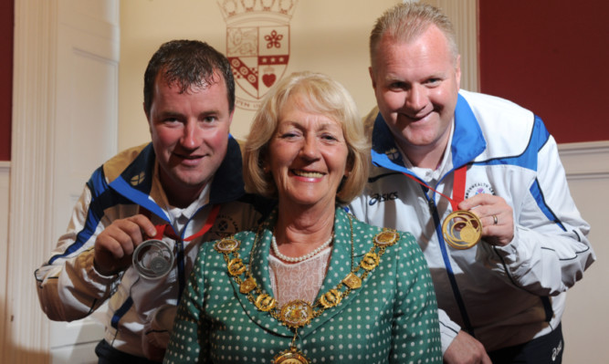 Drew Christie, Helen Oswald and Darren Burnett.